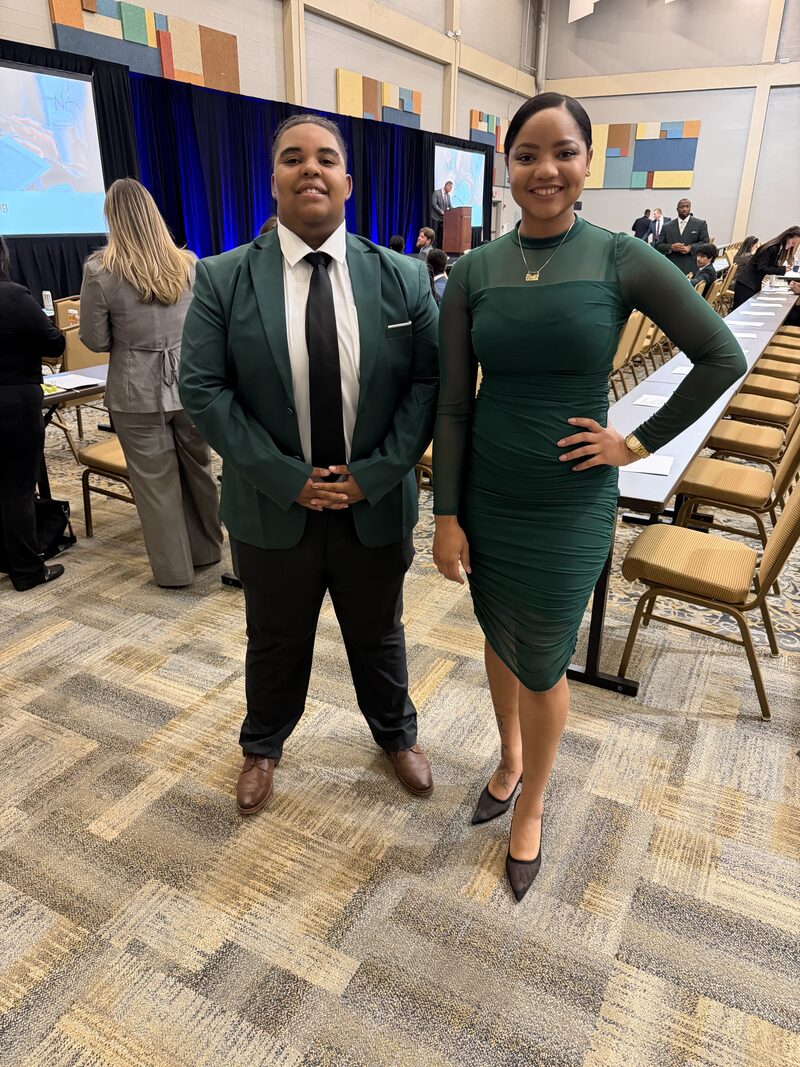 Elite Strategies representatives at a corporate marketing event